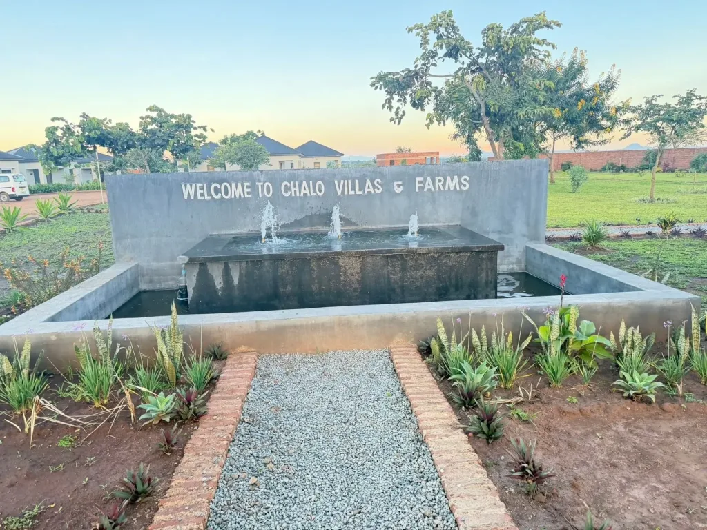 Welcome sign at the entrance of Chalo Villas and Farms